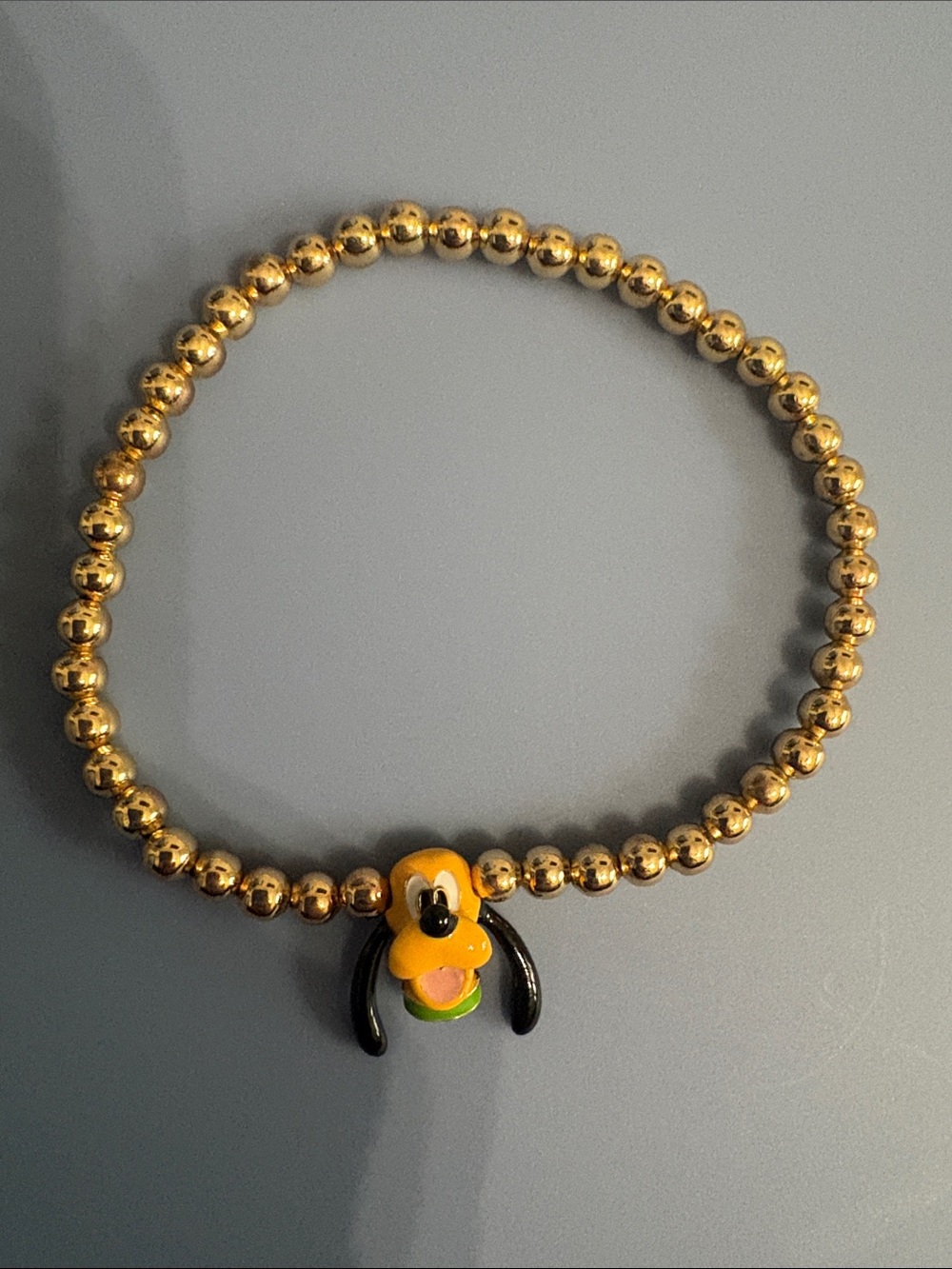 Gold Bead Bracelet with Yellow Character Charm